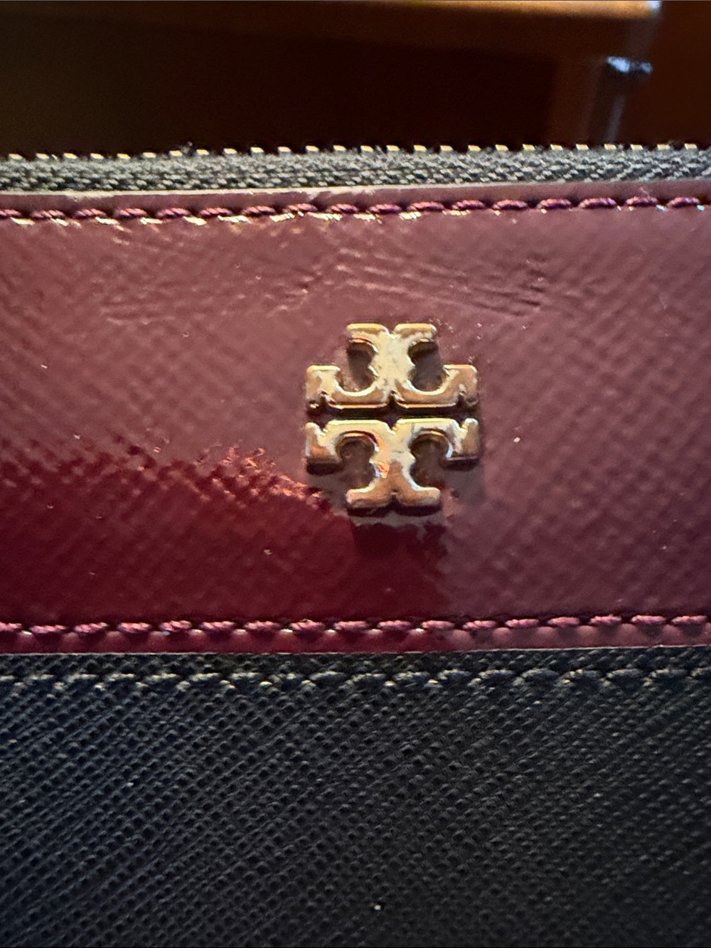 Tory Burch Black and Burgundy ideal Zip Wristlet with Gold Logo